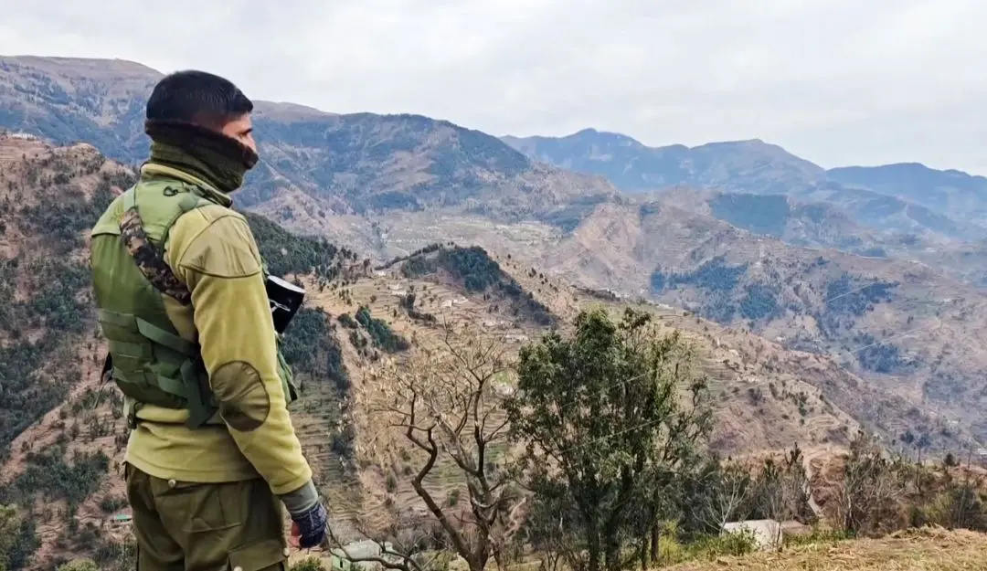 Security personnel keep vigil after the remote Badhaal village was declared a containment zone (Photo: PTI)
