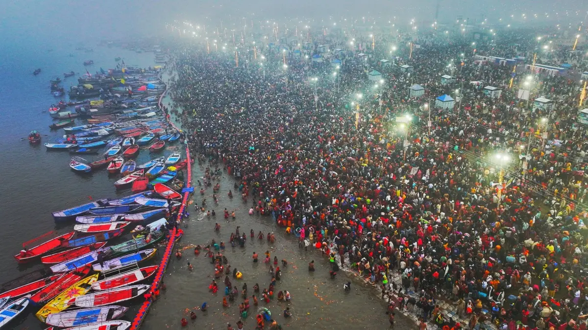 Devotees take a holy dip at Sangam during Maha Kumbh Mela 2025 | Photo: PTI