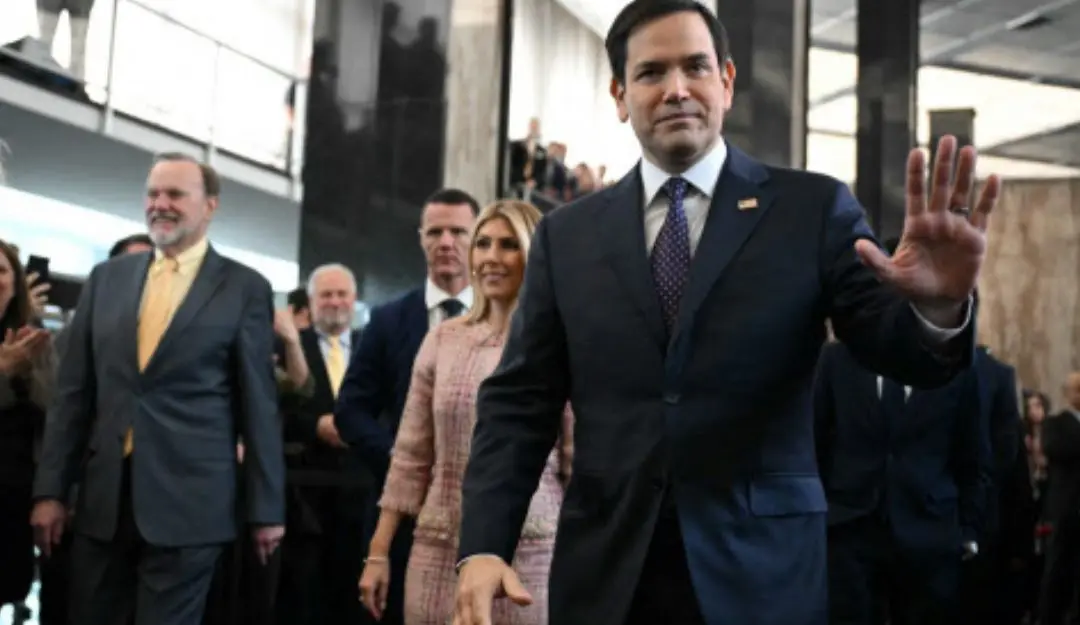 US Secretary of State Marco Rubio and his wife Jeanette Rubio arrive to speak to employees upon arrival at the State Department in Washington, DC. | Photo: AP
