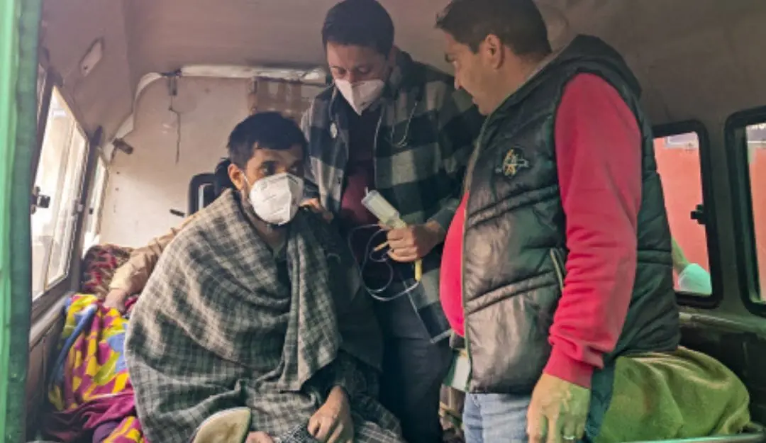 A patient from the Badhaal village being taken to a hospital amid the deaths of at least 17 people belonging to three families, under suspicious circumstances, in Jammu's Rajouri district | Photo: PTI