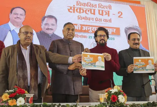 BJP MPs Anurag Thakur and Ramvir Singh Bidhuri with Delhi party President Virendra Sachdeva, and party leader Vijender Gupta during the launch of the second part of the party's 'Sankalp Patra' (manifesto) for the upcoming Delhi Assembly elections, in New Delhi.