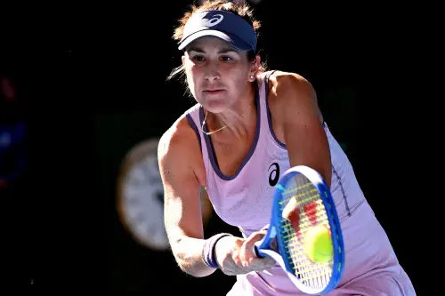 Switzerland's Belinda Bencic hits a return against Japan's Naomi Osaka during their women's singles match on day six of the Australian Open tennis tournament in Melbourne | Photo :  AFP