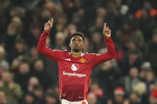 Manchester United's Amad Diallo celebrates after scoring his side's first goal during the English Premier League soccer match between Manchester United and Southampton at the Old Trafford stadium in Manchester, England . | Photo: AP