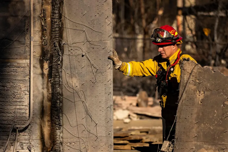 LA firefighters search for victims, brace for winds; Biden says rebuilding to cost tens of billions