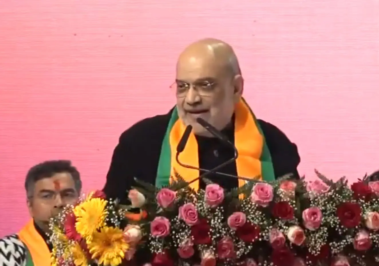 Union Home Minister Amit Shah speaking at the 'Slum Dwellers' conference | Photo: Screengrab of X / ANI