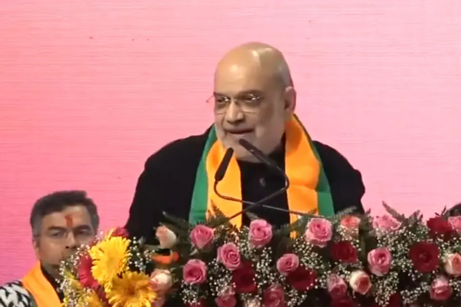 Slum dwellers will 'liberate' Delhi by uprooting 'AAPda' govt: Amit Shah