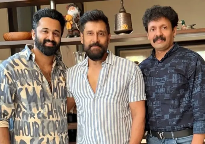 Sree Gokulam Movies' SR Krishnamurthy with Unnimukundan and Vikram | Photo: Instagram/sreegokulammoviesofficial