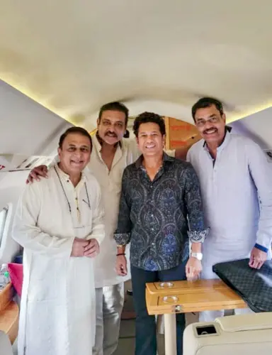 Former India captains and Mumbai players Sunil Gavaskar, Ravi Shastri, Sachin Tendulkar and Dilip Vengsarkar pose for a picture on board the Varanasi bound flight on Saturday. | Photo: ANI