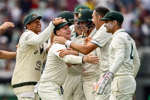 Australia's Steve Smith, Usman Khawaja and teammates celebrate the team's win during Day 5 of the fourth Test match against India, at the Melbourne Cricket Ground, in Melbourne on Monday. | Photo: ANI
