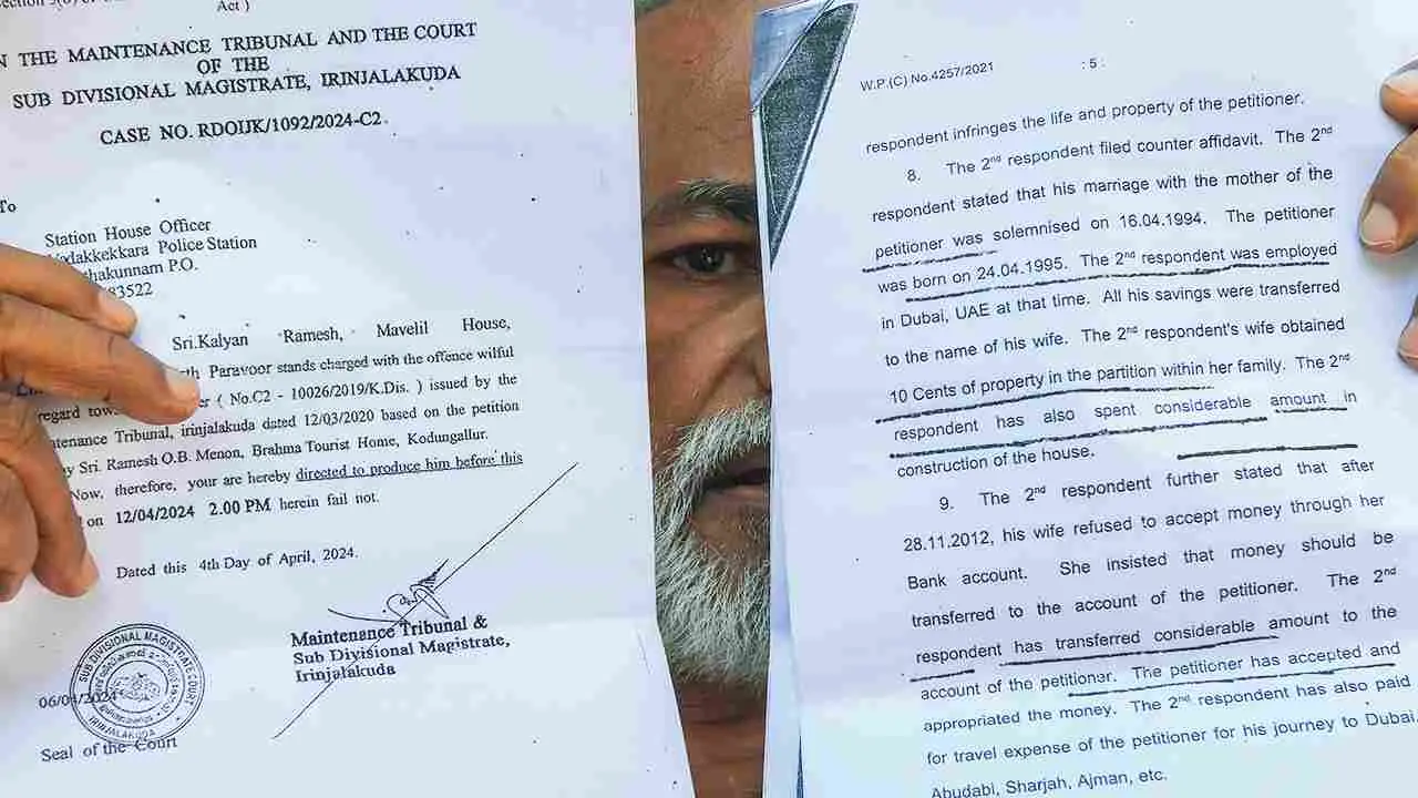 Ramesh Menon holding up the court orders | Photo: Mathrubhumi