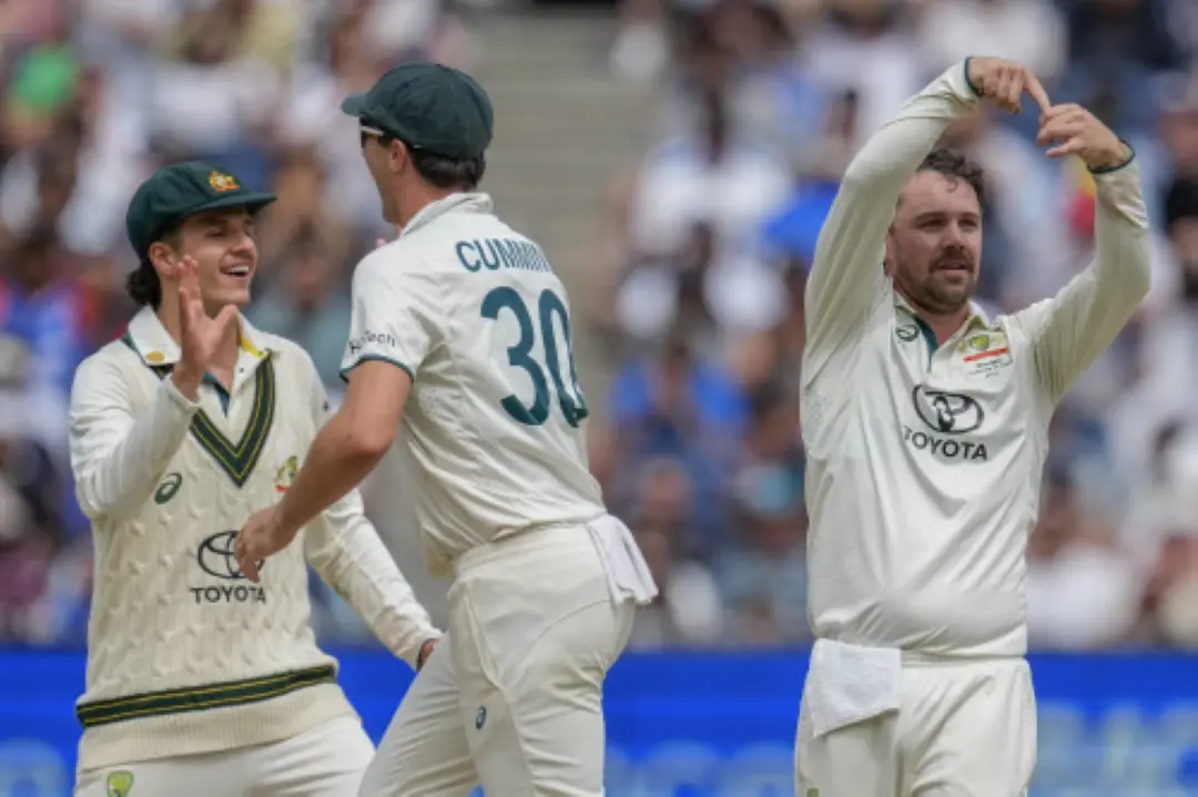 Pat Cummins, center, Travis Head, left, and Sam Konstas celebrates the wicket of India's Rishabh Pant during play on the last day of the fourth cricket test between Australia and India at the Melbourne Cricket Ground. | Photo: AP