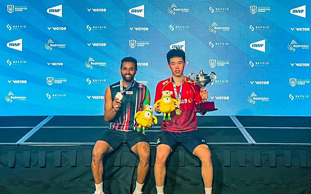 Silver medal winner India's badminton player HS Prannoy with Gold medalist China's Weng Hong Yang after the Australian Open men's singles final at the State Sports Centre | Photo: PTI
