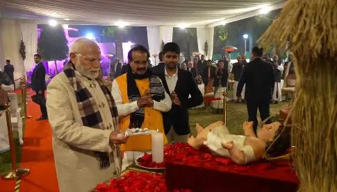 PM during Christmas celebrations at the residence of Union Minister George Kurian | X@PIB_India