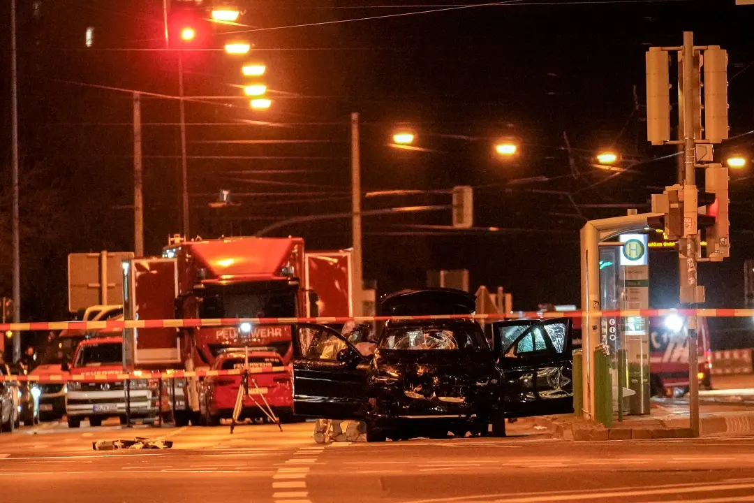 The car that was crashed into a crowd of people at the Magdeburg Christmas market is seen following the attack in Magdeburg, Germany | Photo: AP