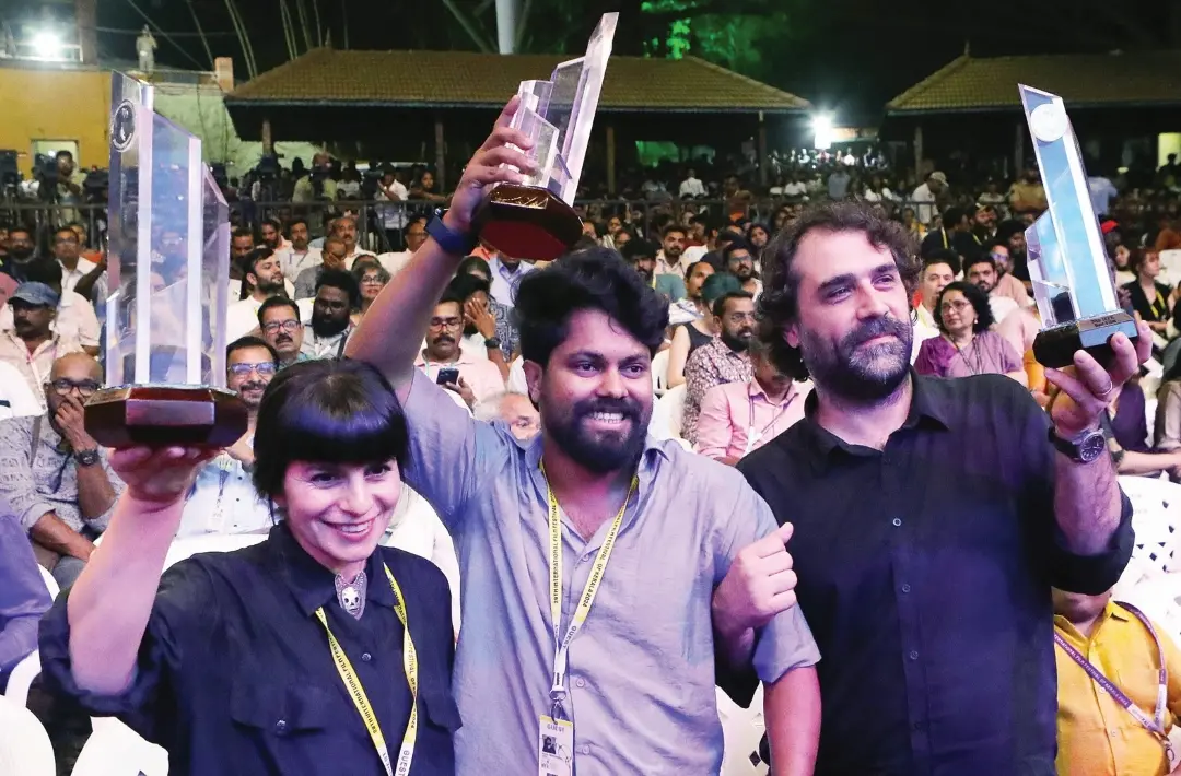 Photo: Natalia Geisse, art director of the Chilean film 'The Hyperboreans,' Fasil Mohammed, director of 'Feminichi Fathima,' and Pedro Freire, director of the Brazilian film 'Malu,' with their awards at the ceremony. | Photo: Mathrubhumi