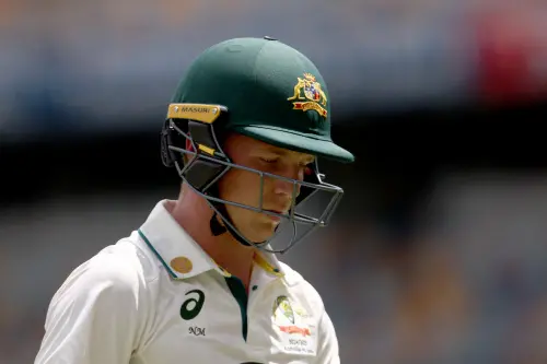 Australia's Nathan McSweeney reacts as he walks off the ground after being dismissed on day five of the third cricket Test match between Australia and India at The Gabba in Brisbane | Photo: AFP