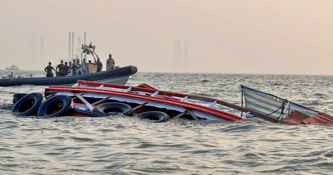 Rescue work underway after a ferry capsized off Mumbai coast when a Navy craft crashed into it