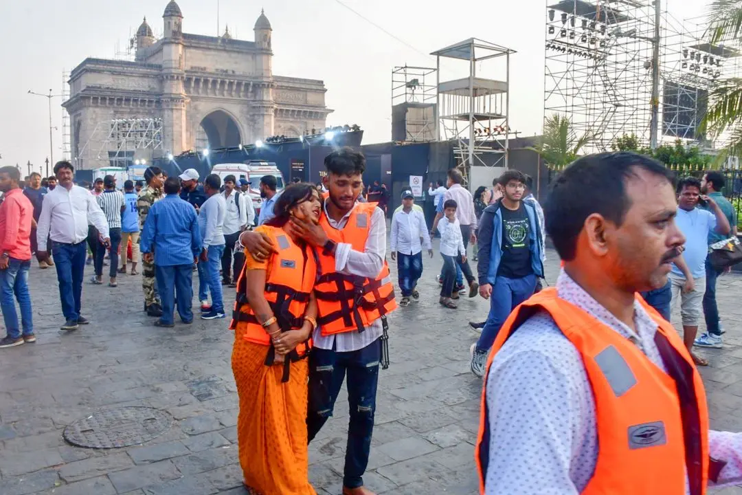 Passengers after being rescued in a joint operation by the Indian Navy and Indian Coast Guard after a ferry capsized off Mumbai coast | Photo: PTI