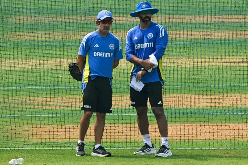 India's head coach Gautam Gambhir (L) and Abhishek Nayar look on during a practice session | Photo : AFP