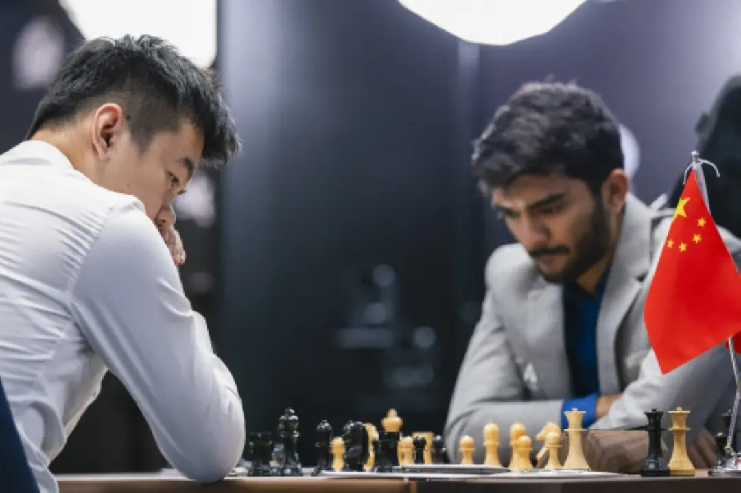 India's D Gukesh and China's Ding Liren during the fifth game of the World Chess Championship in Singapore. | Photo: PTI