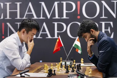 India's D. Gukesh and China's Ding Liren during the 12th game of the FIDE World Chess Championship 2024, in Singapore, Monday | Photo: PTI