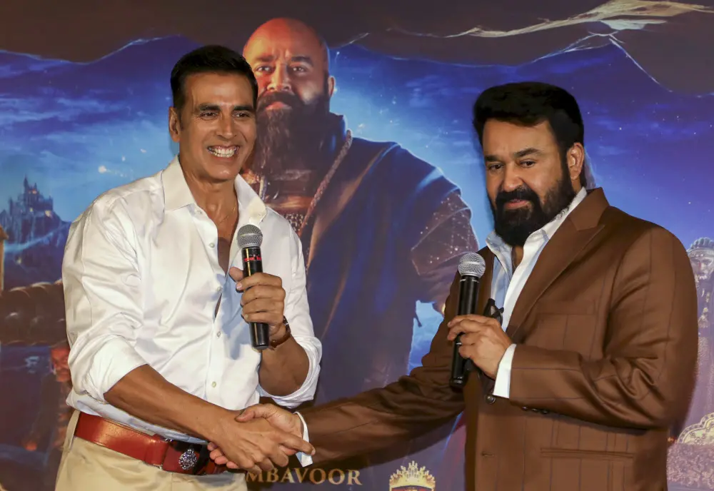 Actors Akshay Kumar, left, and Mohanlal during the trailer launch of the latter's directorial debut film 'Barroz' | PTI