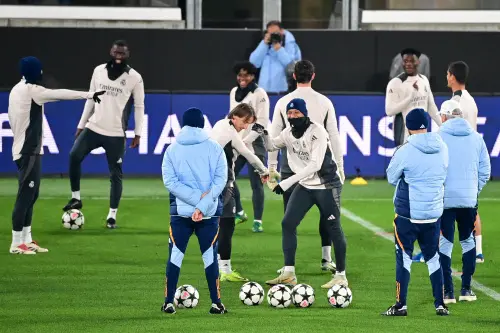 Real Madrid's French forward #9 Kylian Mbappe (C) and Real Madrid's Croatian midfielder #10 Luka Modric attend a training session with teammates on the eve of the UEFA Champions League football match Atalanta vs Real Madrid in Bergamo, Italy  | Photo: AFP