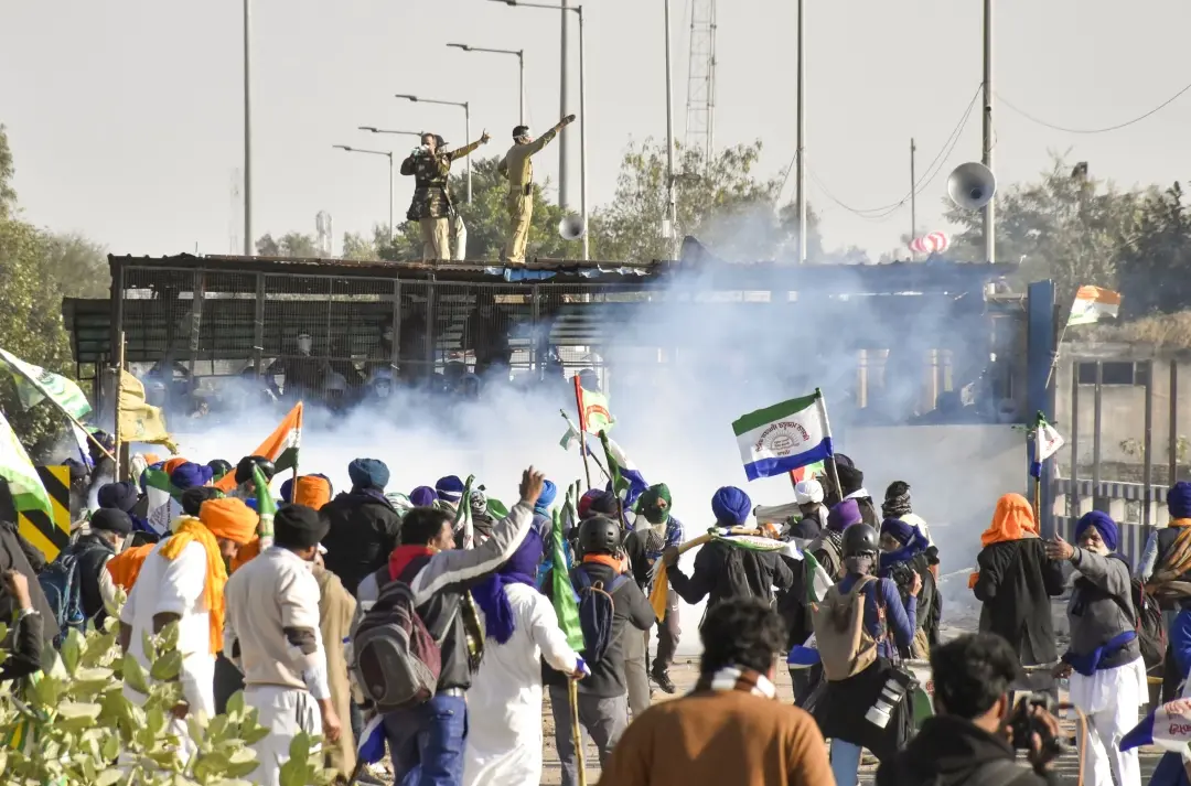 Tear gas being used by security personnel to disperse farmers during their foot march towards Delhi, at Shambhu border | Photo: PTI