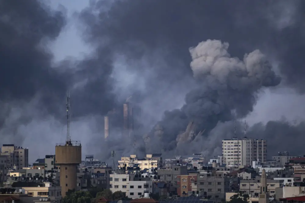 Smoke rises following an Israeli airstrike in Gaza City | AP