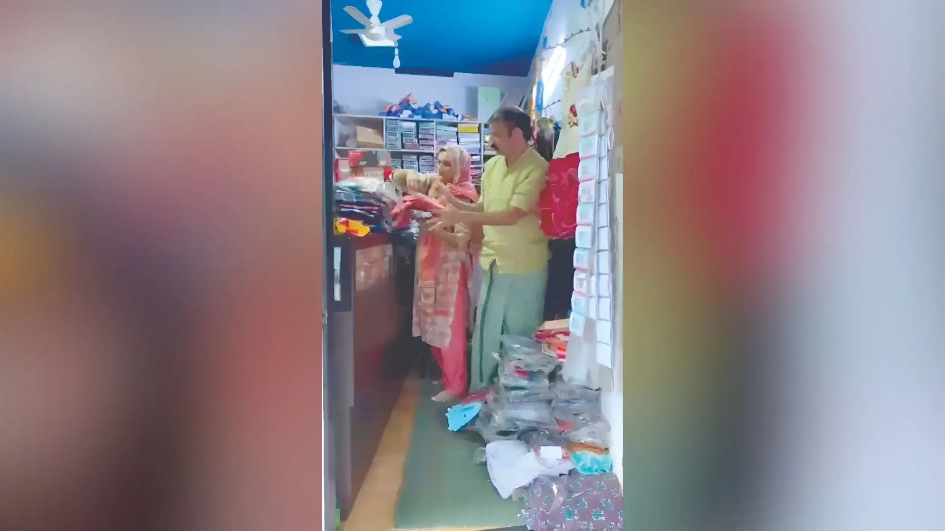 Karim packing garments at his shop to be donated in Wayanad | Photo: Mathrubhumi