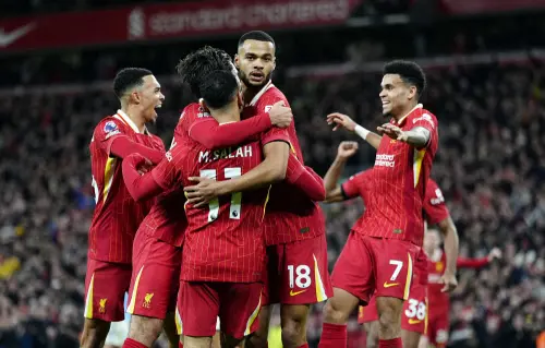 Liverpool's Cody Gakpo, center, celebrates scoring their side's first goal of the game during the match between Liverpool and Manchester City at Anfield Stadium, Liverpool, England   | Photo: AFP