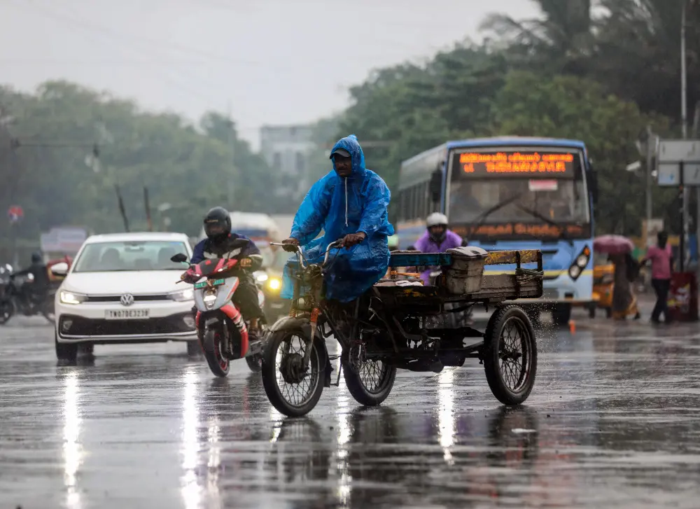 Vehicles on the road amid rainy weather ahead of Cyclone Fengal in Tamil Nadu | ANI