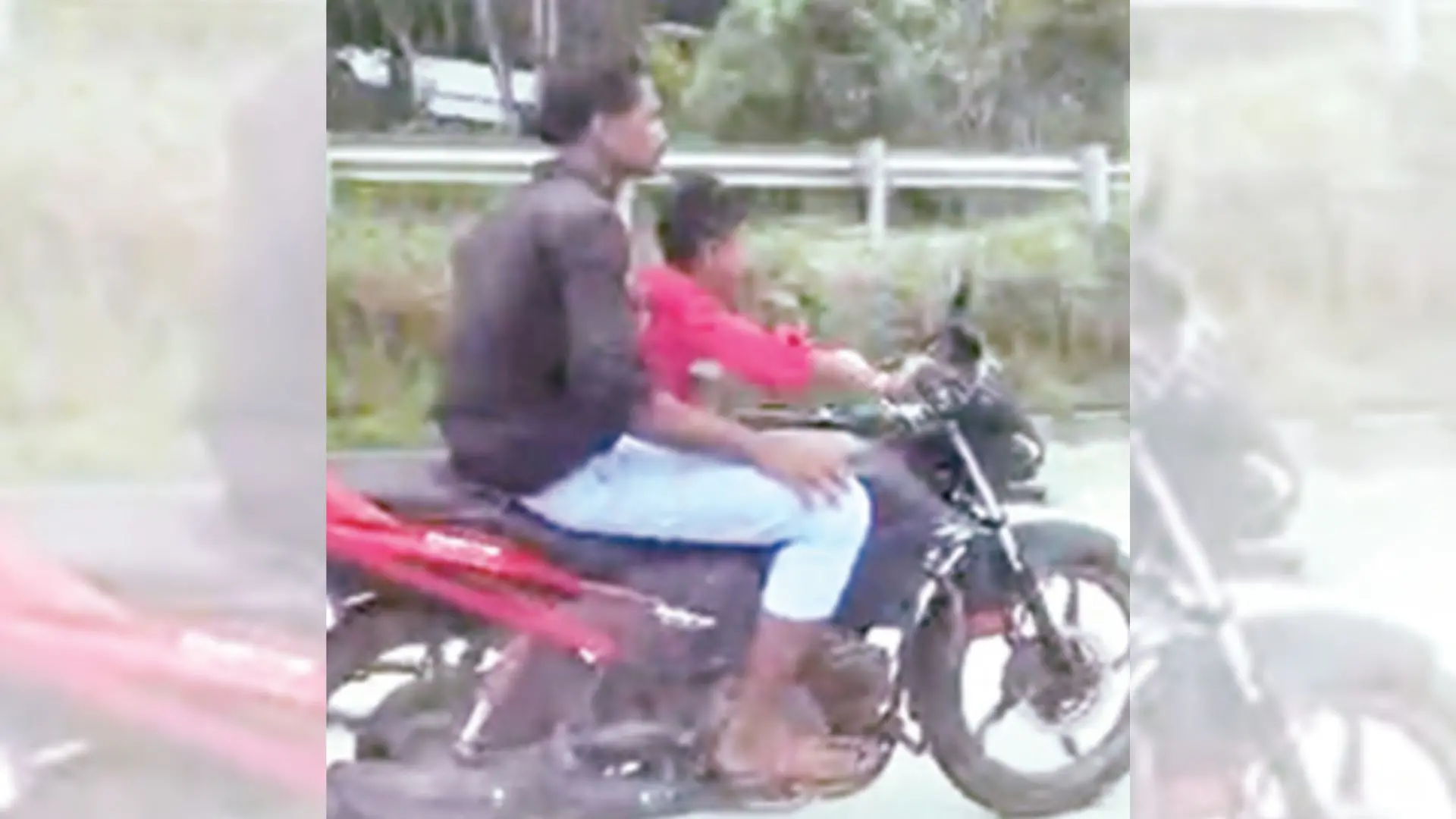 6-year-old riding the bike with his relatives sitting behind