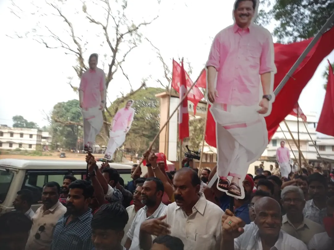 Supporters of LDF candidate U R Pradeep holding his cut out during a victory rally in Chelakkara on Saturday