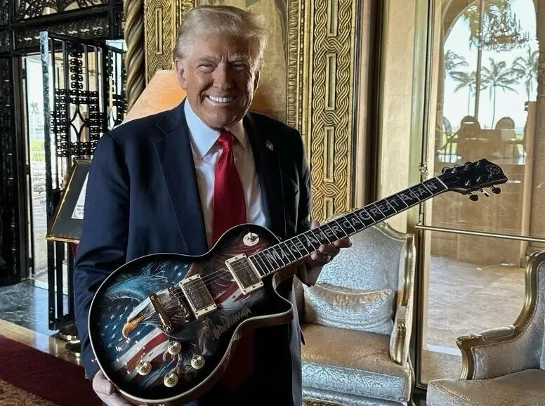 Trump with limited edition '45' guitar