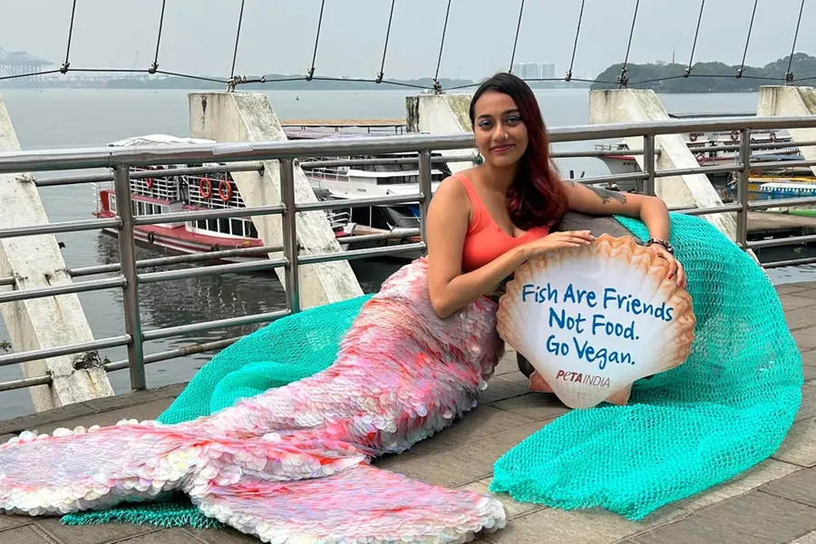Mermaid floats 'fish are friends, not food' message in Kochi | PHOTOS