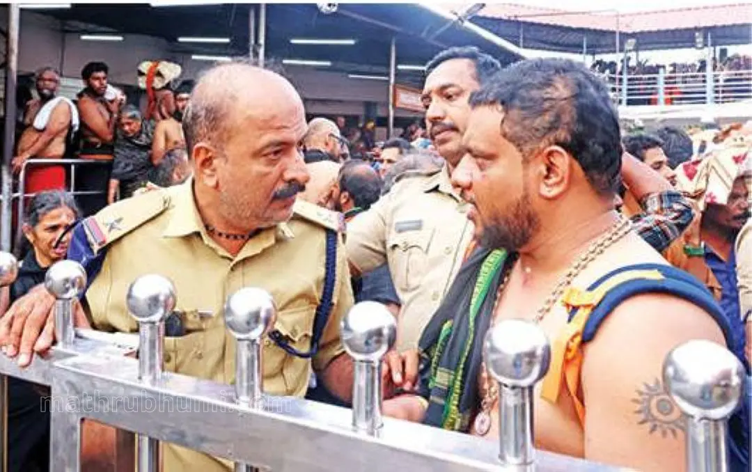 Sadanandan Chepparamba on duty at Sabarimala temple | Photo: Mathrubhumi