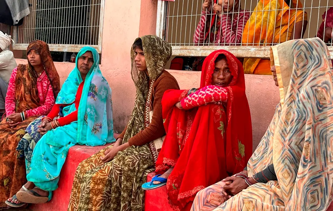 Family members wait outside the emergency ward of the Maharani Laxmi Bai Medical College | Photo: PTI