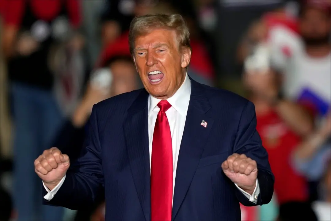 Republican presidential nominee former President Donald Trump gestures to supporters at a campaign rally at Greensboro Coliseum | Photo: AP