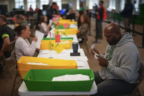 Election workers process mail-in ballots for the 2024 General Election at the Chester County, Pa., administrative offices in West Chester, Pa. | Photo: AP