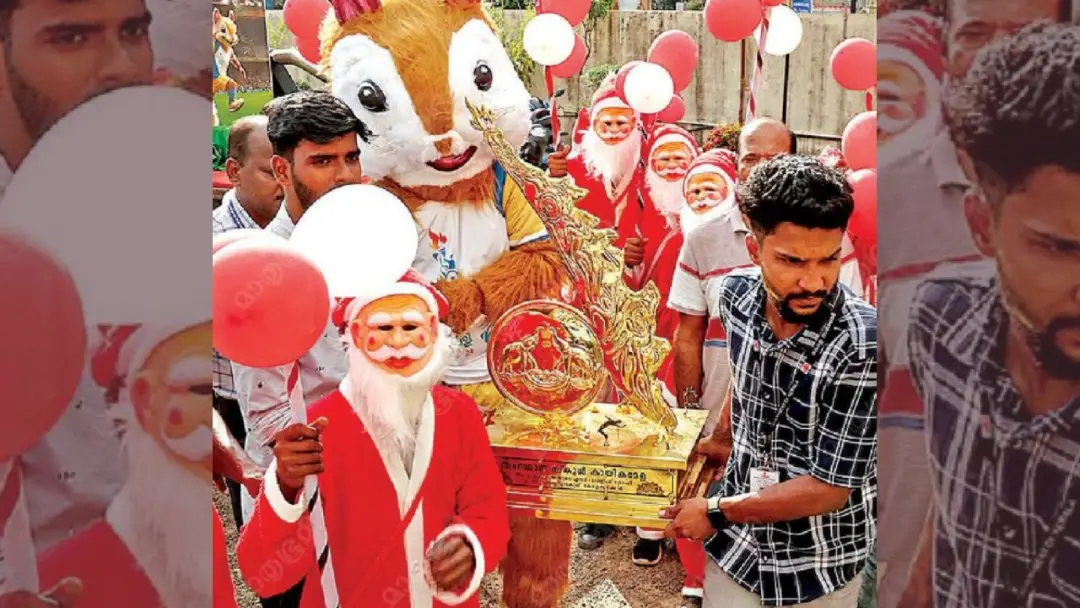 The Chief Minister's Trophy awarded to the overall champions at the State School Sports Meet and the lucky mascot of the sports meet, 'Thakkudu', received a reception at Edappally St. George High School. | Photo: MV Sinoj