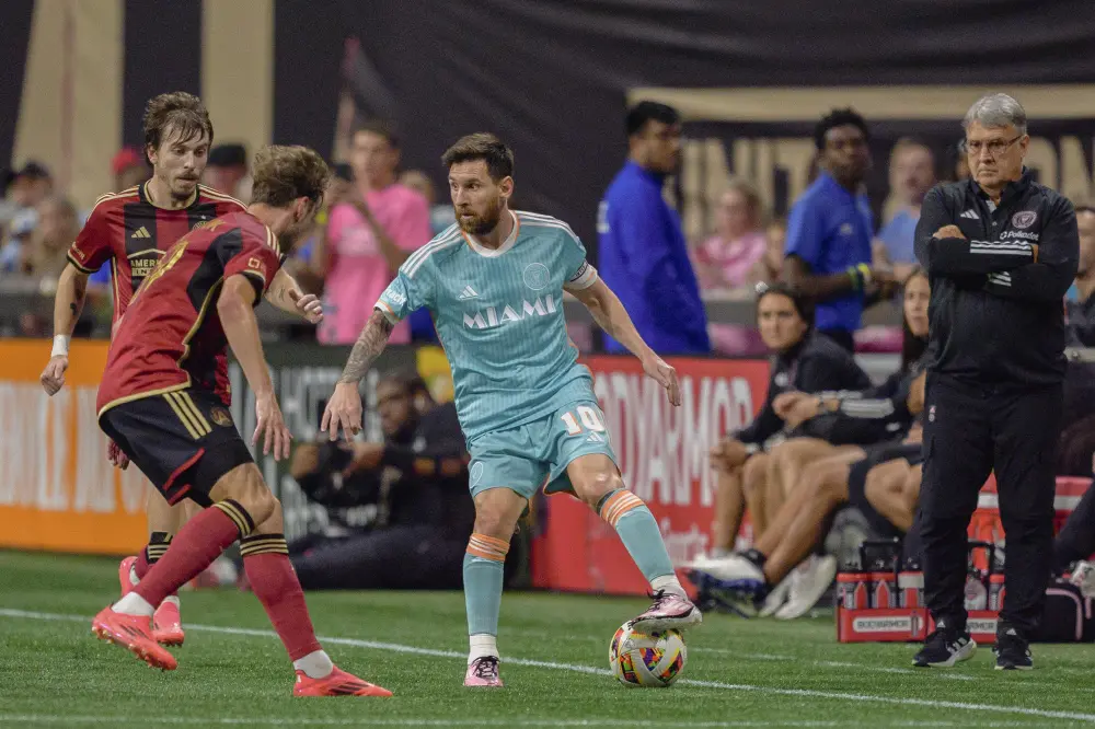 Lionel Messi (10) dribbles the ball during the first half of an MLS soccer match against Atlanta United | AP