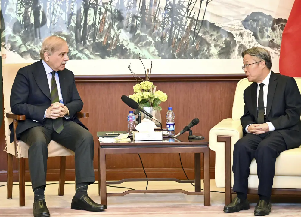 Prime Minister Shehbaz Sharif, left, with Chinese Ambassador Jiang Zaidong | AP
