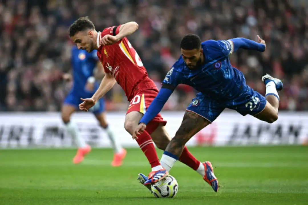 Liverpool's Portuguese striker #20 Diogo Jota vies for the ball with Chelsea's English defender #24 Reece James during the English Premier League football match between Liverpool and Chelsea at Anfield in Liverpool. | File Photo: AFP