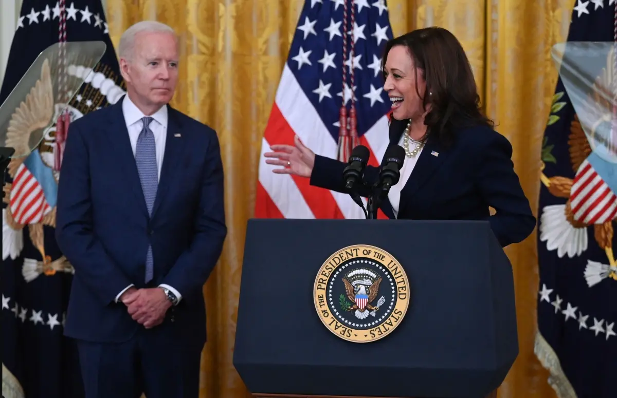 Kamala Harris speaks as Joe Biden looks on | Filephoto: AFP