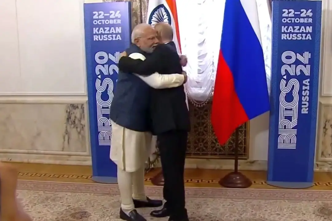 PM Narendra Modi greets Russian President Vladimir Putin ahead of the BRICS summit