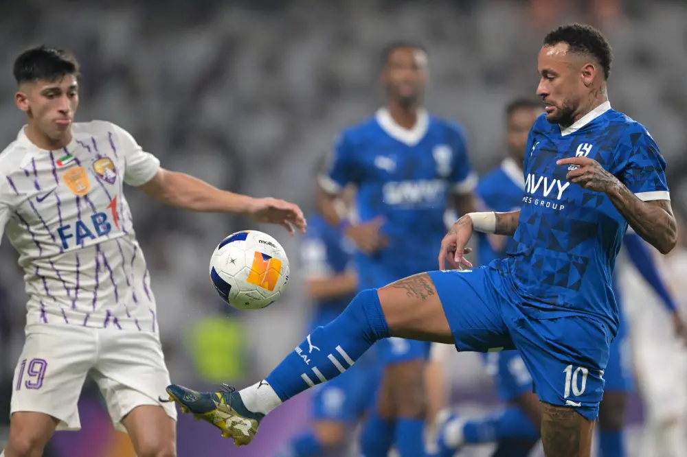 Neymar controls the ball during the AFC Champions League group B football match between UAE's Al-Ain and Saudi's Al-Hilal | AFP