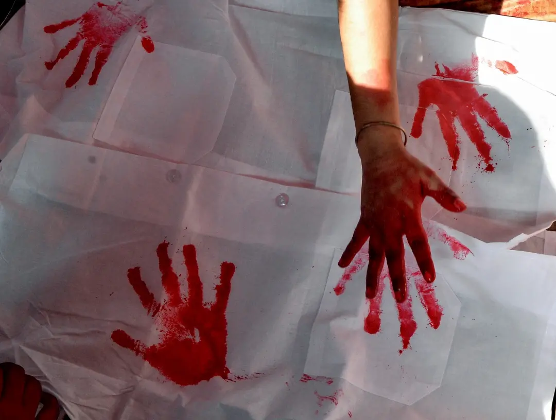 People print their hand impression on a cloth during the Junior Doctors fast-unto-death hunger strike demanding justice for the victim of the RG Kar Hospital rape-murder case | Photo: ANI