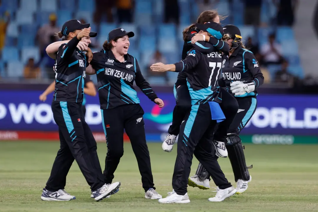 New Zealand's Amelia Kerr celebrates with teammates after taking the wicket of Pakistan's Sadia Iqbal during the ICC Women's T20 World Cup match between New Zealand Women and Pakistan Women at Dubai International Stadium. | Photo: IANS