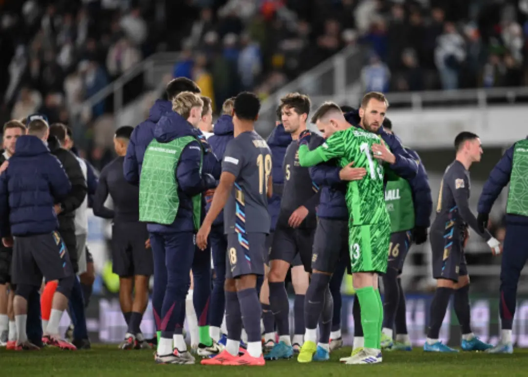 England's team celebrates at the end of the UEFA Nations League, League B Group B2 football match Finland vs England at the Olympic Stadium in Helsinki, Finland. | Photo: AFP
